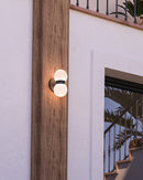 LED Exterior Wall Mount<br /><span style="color:#4AB0CE;">Entrega: 4-10 dias en USA</span><br /><span style="color:#4AB0CE;font-size:60%;">PREGUNTE POR ENTREGA EN PANAMA</span><br />Collection: Peri<br />Finish: Black/Opal Glass