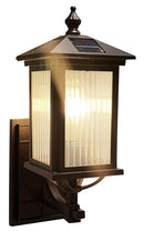 LÁMPARA DE PARED EXTERIOR CON 2 OPCIONES 1XE27 3W LED O PANEL SOLAR 3W, BATERIA 3.7V 2200HA, INCLUYE CONTROL REMOTO,GRADO DE PROTECCION IP43.