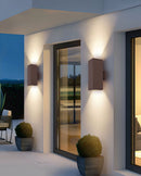 LÁMPARA DE PARED EXTERIOR DECORATIVA CON ILUMINACION UP AND DOWN  2XE27 PARA PAR30-75W, ACABADO BRONCE.