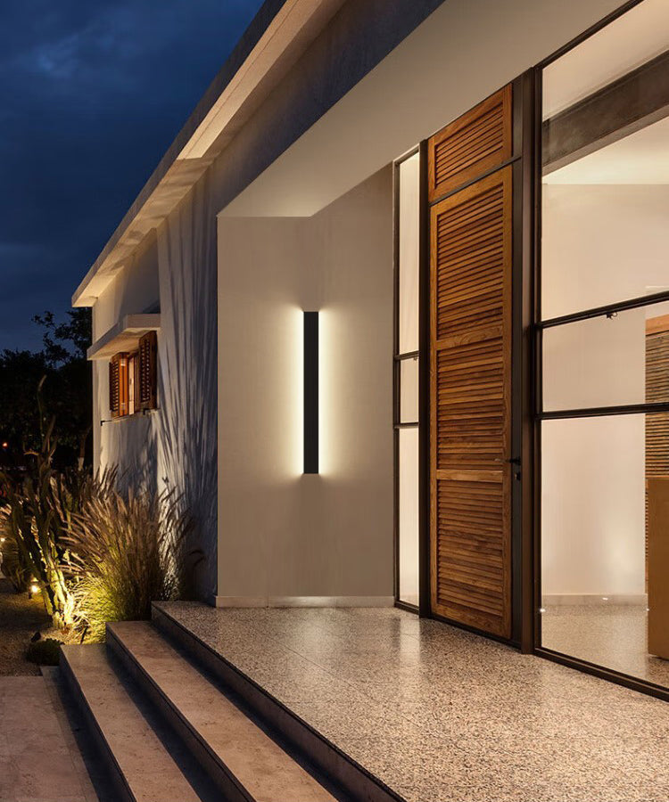 LÁMPARA DE PARED EXTERIOR DECORATIVA LED, 20W, EMITE 1300LM, TONALIDAD DE 3000K, CRI80, 100-240V, 50-60HZ, GRADO DE PROTECCION IP65, ACABADO NEGRO.