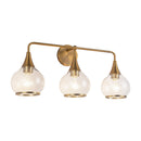 Three Light Bathroom Fixtures<br /><span style="color:#4AB0CE;">Entrega: 4-10 dias en USA</span><br /><span style="color:#4AB0CE;font-size:60%;">PREGUNTE POR ENTREGA EN PANAMA</span><br />Collection: Hazel<br />Finish: Aged Gold/Clear Glass