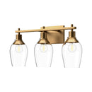 Three Light Bathroom Fixtures<br /><span style="color:#4AB0CE;">Entrega: 4-10 dias en USA</span><br /><span style="color:#4AB0CE;font-size:60%;">PREGUNTE POR ENTREGA EN PANAMA</span><br />Collection: Kingsley<br />Finish: Aged Gold/Clear Glass