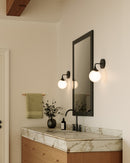 One Light Vanity<br /><span style="color:#4AB0CE;">Entrega: 4-10 dias en USA</span><br /><span style="color:#4AB0CE;font-size:60%;">PREGUNTE POR ENTREGA EN PANAMA</span><br />Collection: Nouveau<br />Finish: Matte Black/Opal Matte Glass