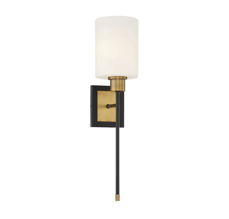 One Light Wall Sconce<br /><span style="color:#4AB0CE;">Entrega: 4-10 dias en USA</span><br /><span style="color:#4AB0CE;font-size:60%;">PREGUNTE POR ENTREGA EN PANAMA</span><br />Collection: Alvara<br />Finish: Matte Black with Warm Brass Accents