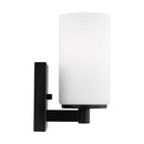 One Light Wall / Bath Sconce<br /><span style="color:#4AB0CE;">Entrega: 4-10 dias en USA</span><br /><span style="color:#4AB0CE;font-size:60%;">PREGUNTE POR ENTREGA EN PANAMA</span><br />Collection: Hettinger<br />Finish: Midnight Black