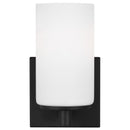 One Light Wall / Bath Sconce<br /><span style="color:#4AB0CE;">Entrega: 4-10 dias en USA</span><br /><span style="color:#4AB0CE;font-size:60%;">PREGUNTE POR ENTREGA EN PANAMA</span><br />Collection: Hettinger<br />Finish: Midnight Black