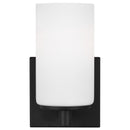 One Light Wall / Bath Sconce<br /><span style="color:#4AB0CE;">Entrega: 4-10 dias en USA</span><br /><span style="color:#4AB0CE;font-size:60%;">PREGUNTE POR ENTREGA EN PANAMA</span><br />Collection: Hettinger<br />Finish: Midnight Black