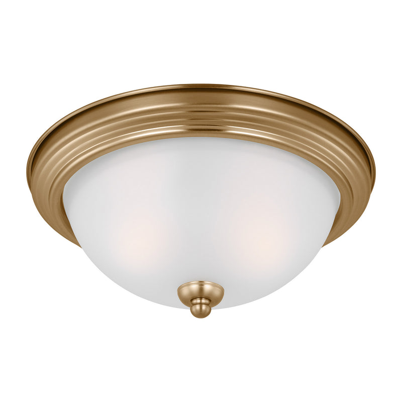 Two Light Flush Mount<br /><span style="color:#4AB0CE;">Entrega: 4-10 dias en USA</span><br /><span style="color:#4AB0CE;font-size:60%;">PREGUNTE POR ENTREGA EN PANAMA</span><br />Collection: Geary<br />Finish: Satin Brass