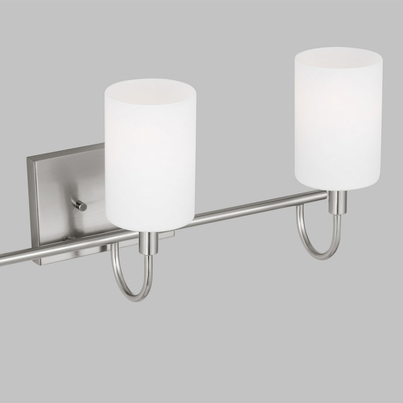 Three Light Bath Vanity<br /><span style="color:#4AB0CE;">Entrega: 4-10 dias en USA</span><br /><span style="color:#4AB0CE;font-size:60%;">PREGUNTE POR ENTREGA EN PANAMA</span><br />Collection: Oak Moore<br />Finish: Brushed Nickel