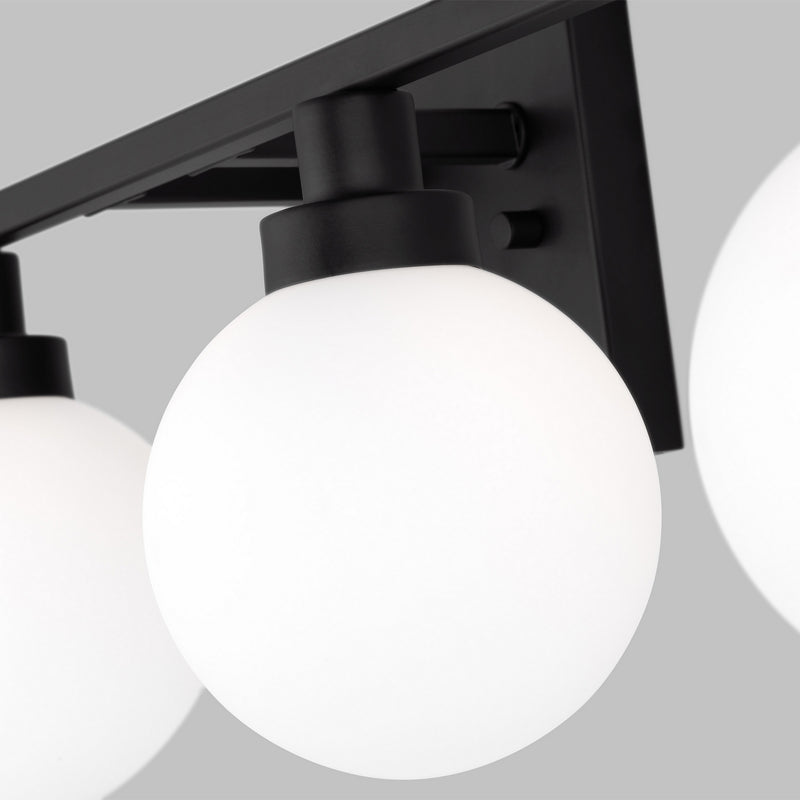 Four Light Bath Vanity<br /><span style="color:#4AB0CE;">Entrega: 4-10 dias en USA</span><br /><span style="color:#4AB0CE;font-size:60%;">PREGUNTE POR ENTREGA EN PANAMA</span><br />Collection: Clybourn<br />Finish: Midnight Black