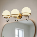 Three Light Wall Vanity<br /><span style="color:#4AB0CE;">Entrega: 1-2 semanas en USA</span><br /><span style="color:#4AB0CE;font-size:60%;">PREGUNTE POR ENTREGA EN PANAMA</span><br />Collection: Alba<br />Finish: Aged Gold/Opal Glass
