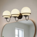 Three Light Wall Vanity<br /><span style="color:#4AB0CE;">Entrega: 4-10 dias en USA</span><br /><span style="color:#4AB0CE;font-size:60%;">PREGUNTE POR ENTREGA EN PANAMA</span><br />Collection: Alba<br />Finish: Matte Black/Opal Glass
