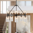 Ten Light Chandelier<br /><span style="color:#4AB0CE;">Entrega: 4-10 dias en USA</span><br /><span style="color:#4AB0CE;font-size:60%;">PREGUNTE POR ENTREGA EN PANAMA</span><br />Collection: Nelly<br />Finish: Matte Black/Clear Ribbed Glass