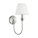 One Light Wall Sconce<br /><span style="color:#4AB0CE;">Entrega: 4-10 dias en USA</span><br /><span style="color:#4AB0CE;font-size:60%;">PREGUNTE POR ENTREGA EN PANAMA</span><br />Collection: Elsay<br />Finish: Brushed Nickel