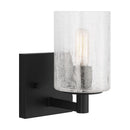 One Light Wall / Bath Sconce<br /><span style="color:#4AB0CE;">Entrega: 4-10 dias en USA</span><br /><span style="color:#4AB0CE;font-size:60%;">PREGUNTE POR ENTREGA EN PANAMA</span><br />Collection: Parker<br />Finish: Midnight Black