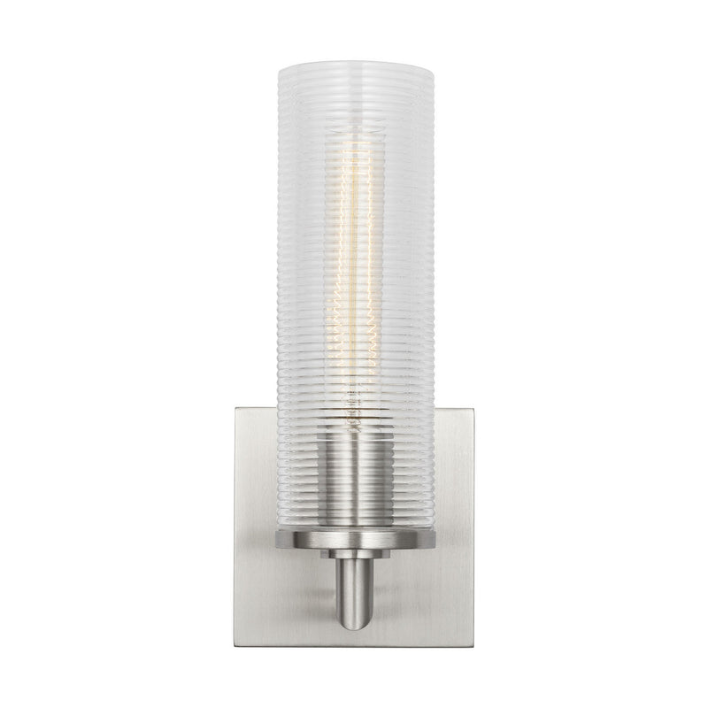 One Light Wall Sconce<br /><span style="color:#4AB0CE;">Entrega: 4-10 dias en USA</span><br /><span style="color:#4AB0CE;font-size:60%;">PREGUNTE POR ENTREGA EN PANAMA</span><br />Collection: Sarita<br />Finish: Brushed Nickel