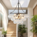 Six Light Chandelier<br /><span style="color:#4AB0CE;">Entrega: 4-10 dias en USA</span><br /><span style="color:#4AB0CE;font-size:60%;">PREGUNTE POR ENTREGA EN PANAMA</span><br />Collection: Faye<br />Finish: Matte Black/Clear Ribbed Glass