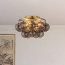 Three Light Semi-Flush Mount<br /><span style="color:#4AB0CE;">Entrega: 4-10 dias en USA</span><br /><span style="color:#4AB0CE;font-size:60%;">PREGUNTE POR ENTREGA EN PANAMA</span><br />Collection: Faye<br />Finish: Brushed Gold/Smoked Glass
