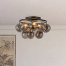 Three Light Semi-Flush Mount<br /><span style="color:#4AB0CE;">Entrega: 4-10 dias en USA</span><br /><span style="color:#4AB0CE;font-size:60%;">PREGUNTE POR ENTREGA EN PANAMA</span><br />Collection: Faye<br />Finish: Matte Black/Smoked Solid Glass