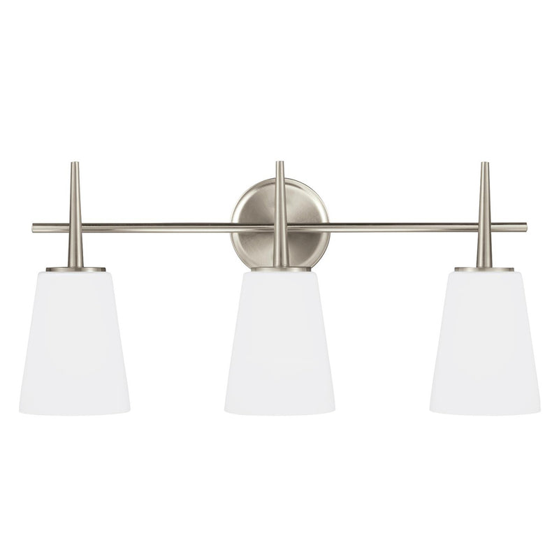 Three Light Wall / Bath<br /><span style="color:#4AB0CE;">Entrega: 4-10 dias en USA</span><br /><span style="color:#4AB0CE;font-size:60%;">PREGUNTE POR ENTREGA EN PANAMA</span><br />Collection: Driscoll<br />Finish: Brushed Nickel