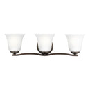 Three Light Wall / Bath<br /><span style="color:#4AB0CE;">Entrega: 4-10 dias en USA</span><br /><span style="color:#4AB0CE;font-size:60%;">PREGUNTE POR ENTREGA EN PANAMA</span><br />Collection: Emmons<br />Finish: Bronze