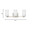 Three Light Wall / Bath<br /><span style="color:#4AB0CE;">Entrega: 4-10 dias en USA</span><br /><span style="color:#4AB0CE;font-size:60%;">PREGUNTE POR ENTREGA EN PANAMA</span><br />Collection: Hettinger<br />Finish: Brushed Nickel