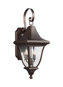 Two Light Outdoor Wall Lantern<br /><span style="color:#4AB0CE;">Entrega: 4-10 dias en USA</span><br /><span style="color:#4AB0CE;font-size:60%;">PREGUNTE POR ENTREGA EN PANAMA</span><br />Collection: Oakmont<br />Finish: Patina Bronze