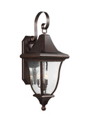 Three Light Outdoor Wall Lantern<br /><span style="color:#4AB0CE;">Entrega: 6-7 semanas en USA</span><br /><span style="color:#4AB0CE;font-size:60%;">PREGUNTE POR ENTREGA EN PANAMA</span><br />Collection: Oakmont<br />Finish: Patina Bronze