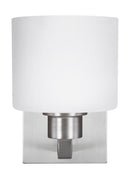 One Light Wall / Bath Sconce<br /><span style="color:#4AB0CE;">Entrega: 4-10 dias en USA</span><br /><span style="color:#4AB0CE;font-size:60%;">PREGUNTE POR ENTREGA EN PANAMA</span><br />Collection: Canfield<br />Finish: Brushed Nickel