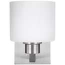 One Light Wall / Bath Sconce<br /><span style="color:#4AB0CE;">Entrega: 4-10 dias en USA</span><br /><span style="color:#4AB0CE;font-size:60%;">PREGUNTE POR ENTREGA EN PANAMA</span><br />Collection: Canfield<br />Finish: Brushed Nickel