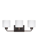 Three Light Wall / Bath<br /><span style="color:#4AB0CE;">Entrega: 4-10 dias en USA</span><br /><span style="color:#4AB0CE;font-size:60%;">PREGUNTE POR ENTREGA EN PANAMA</span><br />Collection: Canfield<br />Finish: Bronze