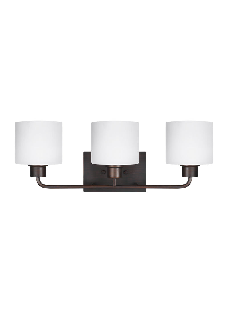 Three Light Wall / Bath<br /><span style="color:#4AB0CE;">Entrega: 4-10 dias en USA</span><br /><span style="color:#4AB0CE;font-size:60%;">PREGUNTE POR ENTREGA EN PANAMA</span><br />Collection: Canfield<br />Finish: Bronze