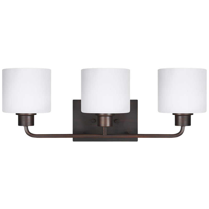 Three Light Wall / Bath<br /><span style="color:#4AB0CE;">Entrega: 4-10 dias en USA</span><br /><span style="color:#4AB0CE;font-size:60%;">PREGUNTE POR ENTREGA EN PANAMA</span><br />Collection: Canfield<br />Finish: Bronze