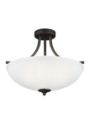Three Light Semi-Flush Convertible Pendant<br /><span style="color:#4AB0CE;">Entrega: 11-12 semanas en USA</span><br /><span style="color:#4AB0CE;font-size:60%;">PREGUNTE POR ENTREGA EN PANAMA</span><br />Collection: Geary<br />Finish: Bronze