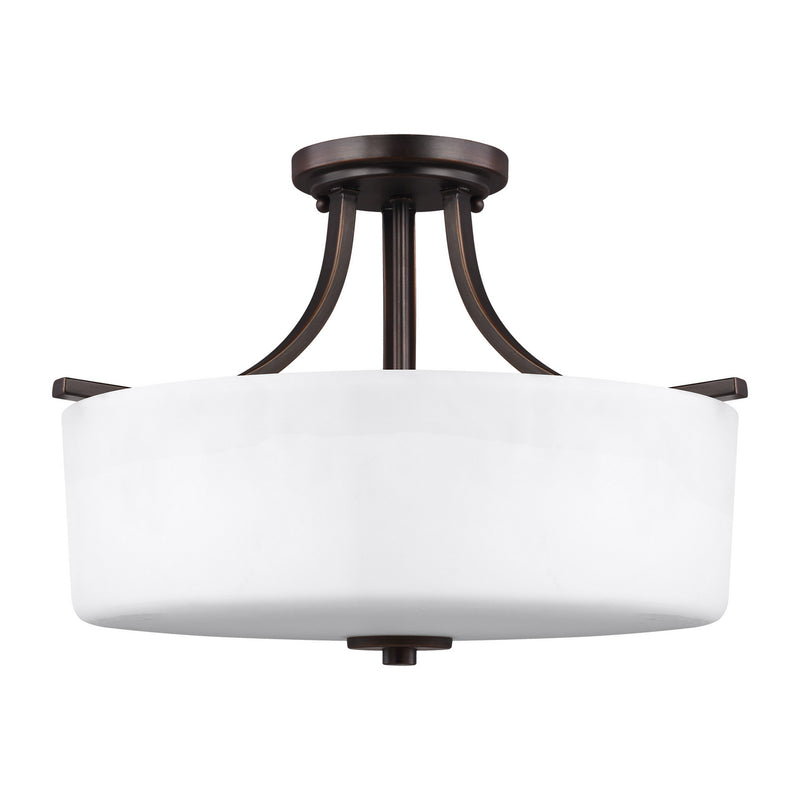 Three Light Semi-Flush Mount<br /><span style="color:#4AB0CE;">Entrega: 4-10 dias en USA</span><br /><span style="color:#4AB0CE;font-size:60%;">PREGUNTE POR ENTREGA EN PANAMA</span><br />Collection: Canfield<br />Finish: Bronze