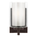One Light Wall / Bath Sconce<br /><span style="color:#4AB0CE;">Entrega: 4-10 dias en USA</span><br /><span style="color:#4AB0CE;font-size:60%;">PREGUNTE POR ENTREGA EN PANAMA</span><br />Collection: Elmwood Park<br />Finish: Bronze