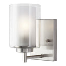 One Light Wall / Bath Sconce<br /><span style="color:#4AB0CE;">Entrega: 4-10 dias en USA</span><br /><span style="color:#4AB0CE;font-size:60%;">PREGUNTE POR ENTREGA EN PANAMA</span><br />Collection: Elmwood Park<br />Finish: Brushed Nickel