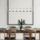 Alora - LP309007NBCG - Seven Light Island Pendant - Revolve - Clear Glass/Natural Brass