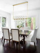 14 Light Island Pendant<br /><span style="color:#4AB0CE;">Entrega: 4-10 dias en USA</span><br /><span style="color:#4AB0CE;font-size:60%;">PREGUNTE POR ENTREGA EN PANAMA</span><br />Collection: Revolve<br />Finish: Clear Glass/Natural Brass
