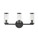 Three Light Bathroom Fixture<br /><span style="color:#4AB0CE;">Entrega: 4-10 dias en USA</span><br /><span style="color:#4AB0CE;font-size:60%;">PREGUNTE POR ENTREGA EN PANAMA</span><br />Collection: Revolve<br />Finish: Clear Glass/Urban Bronze