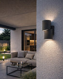 Lámpara de pared exterior decorativa con luz led 13W acabado gris oscuro.