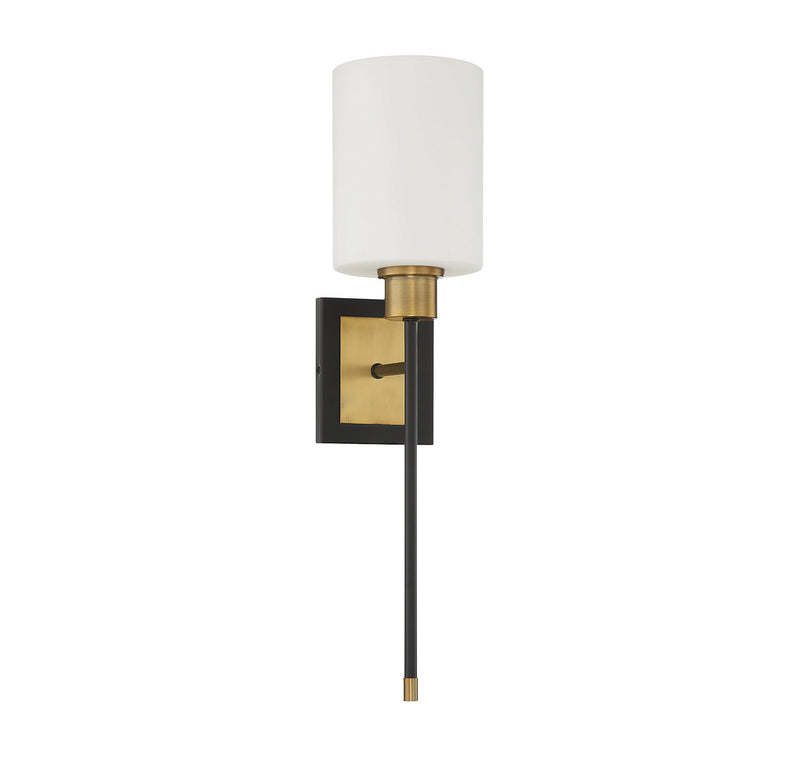 One Light Wall Sconce<br /><span style="color:#4AB0CE;">Entrega: 4-10 dias en USA</span><br /><span style="color:#4AB0CE;font-size:60%;">PREGUNTE POR ENTREGA EN PANAMA</span><br />Collection: Alvara<br />Finish: Matte Black with Warm Brass Accents