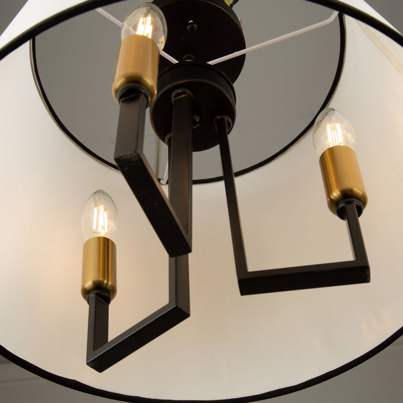 Three Light Semi-Flush Mount<br /><span style="color:#4AB0CE;">Entrega: 4-10 dias en USA</span><br /><span style="color:#4AB0CE;font-size:60%;">PREGUNTE POR ENTREGA EN PANAMA</span><br />Collection: Coco<br />Finish: Gold, Black