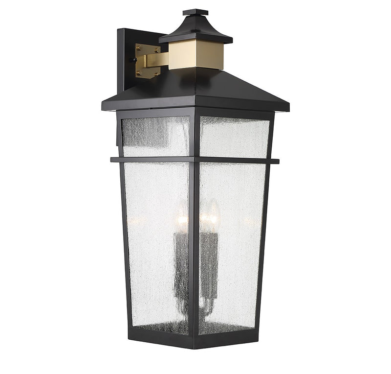 Four Light Outdoor Wall Lantern<br /><span style="color:#4AB0CE;">Entrega: 4-10 dias en USA</span><br /><span style="color:#4AB0CE;font-size:60%;">PREGUNTE POR ENTREGA EN PANAMA</span><br />Collection: Kingsley<br />Finish: Matte Black with Warm Brass