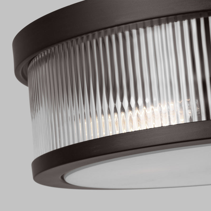 Two Light Flush Mount<br /><span style="color:#4AB0CE;">Entrega: 4-10 dias en USA</span><br /><span style="color:#4AB0CE;font-size:60%;">PREGUNTE POR ENTREGA EN PANAMA</span><br />Collection: Geneva<br />Finish: Aged Iron