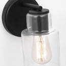One Light Wall Sconce<br /><span style="color:#4AB0CE;">Entrega: 4-10 dias en USA</span><br /><span style="color:#4AB0CE;font-size:60%;">PREGUNTE POR ENTREGA EN PANAMA</span><br />Collection: Sayward<br />Finish: Midnight Black