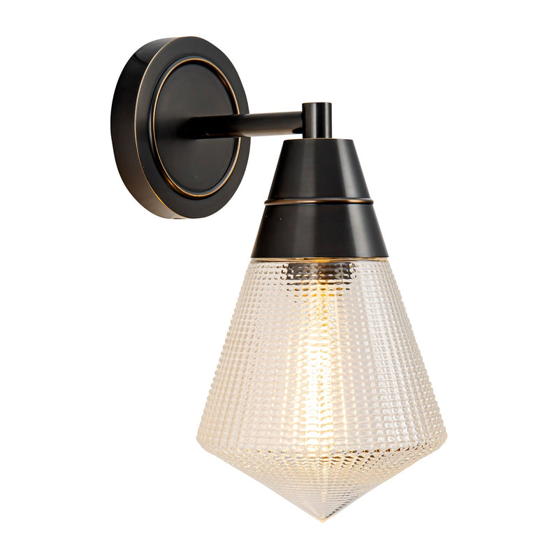 One Light Wall Sconce<br /><span style="color:#4AB0CE;">Entrega: 4-10 dias en USA</span><br /><span style="color:#4AB0CE;font-size:60%;">PREGUNTE POR ENTREGA EN PANAMA</span><br />Collection: Willard<br />Finish: Urban Bronze/Prismatic Glass