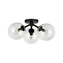 Three Light Semi-Flush Mount<br /><span style="color:#4AB0CE;">Entrega: 4-10 dias en USA</span><br /><span style="color:#4AB0CE;font-size:60%;">PREGUNTE POR ENTREGA EN PANAMA</span><br />Collection: Cassia<br />Finish: Matte Black/Clear Glass