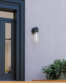 One Light Exterior Wall Mount<br /><span style="color:#4AB0CE;">Entrega: 4-10 dias en USA</span><br /><span style="color:#4AB0CE;font-size:60%;">PREGUNTE POR ENTREGA EN PANAMA</span><br />Collection: Lima<br />Finish: Black/Clear Water Glass