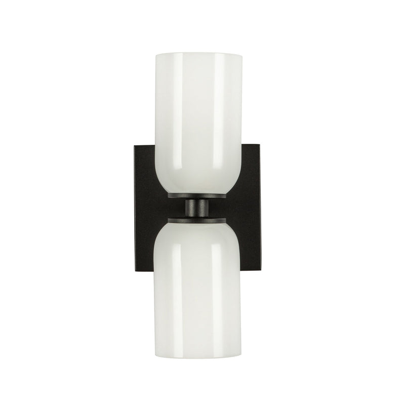 Two Light Wall Sconce<br /><span style="color:#4AB0CE;">Entrega: 4-10 dias en USA</span><br /><span style="color:#4AB0CE;font-size:60%;">PREGUNTE POR ENTREGA EN PANAMA</span><br />Collection: Nola<br />Finish: Black/Glossy Opal Glass